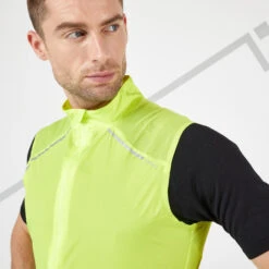 KIPRUN LIGHT MEN'S RUNNING JACKET SLEEVELESS LIGHT YELLOW 17 KIPRUN LIGHT MEN'S RUNNING JACKET SLEEVELESS LIGHT YELLOW -Athletics Store k06a35a4e0c557040a57b3ccfb2a9bd80